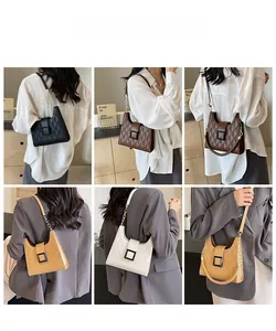 Chic quilted tote bag shown in four colors styled with modern urban fashion outfits