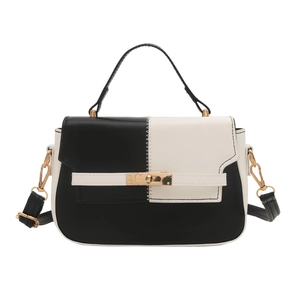 Classic black and white contrast leather crossbody bag with elegant gold metal buckle