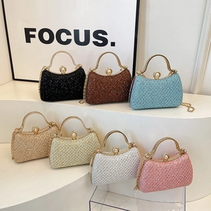 Elegant hard shell evening clutch bags with pearl clasps and chain straps in seven colors