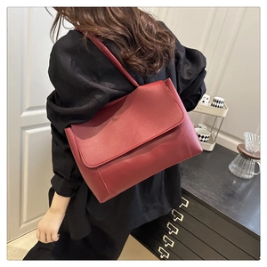 Deep red vintage tote bag in high-quality matte leather for daily commute and styling