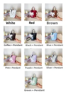 Detail showing various colors of the minimalist crossbody tote bag with floral pendant