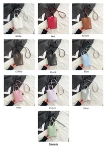 Vertical leather tote bag shown in ten different colors with various styling options