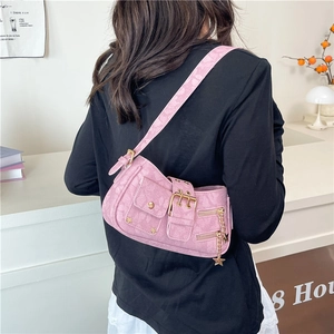 Pink Y2K star rivet underarm bag with vintage floral texture and gold hardware details