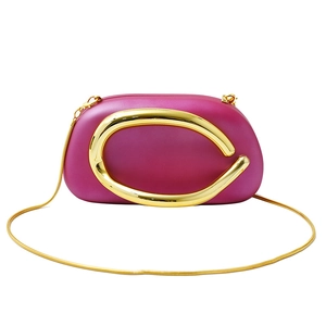 Mini rose red hard shell clutch with gold C-handle and detachable snake chain strap