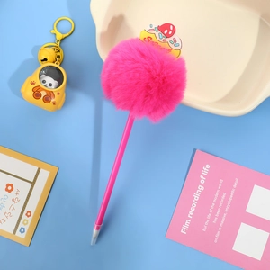 Creative rose red plush ball pen with sweet cake decor and yellow cat bell on blue surface