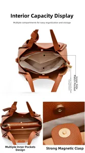 Detail view of brown lychee grain tote bag with multi-compartment interior and magnetic clasp