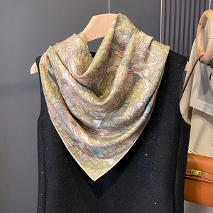 Double-sided floral print silk scarf displayed on a hanger for professional styling