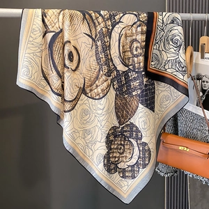 Elegant camellia print silk scarf with retro plaid pattern and earth tone finish
