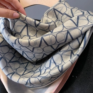 Elegant geometric V-pattern silk scarf in grey and blue with pink contrast edge for women