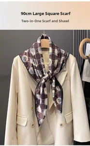 Detailed view of oversized 90cm square silk scarf with camellia print and black borders