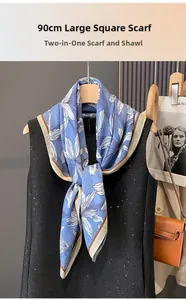 Detail of 90cm floral silk scarf showing premium edge stitching and versatile draping style