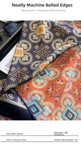 Detailed view of 90cm square silk scarf with geometric pattern and rolled edge details