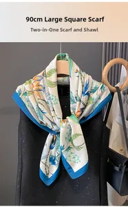 Detail of 90cm oversized silk scarf with tropical floral print on a stylish hanger
