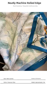 Close-up of tropical floral print scarf with precise machine-rolled edges and texture