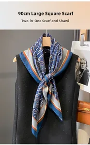 Detail of 90cm oversized square scarf with vintage blue and orange paisley pattern