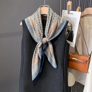 Navy and orange plaid scarf wrap with fine check pattern and dark blue piping design