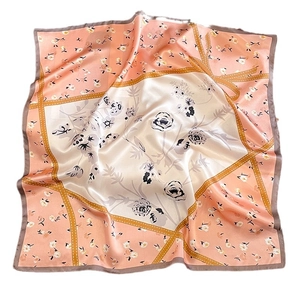 Floral print silk square scarf in pink and beige patchwork design with black roses