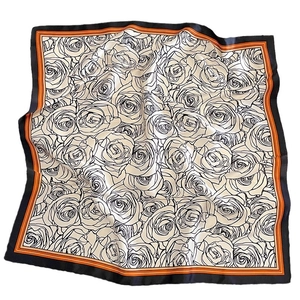 Elegant silk scarf with black and white rose pattern and orange striped border