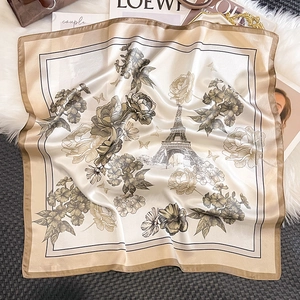 Detail of silk square scarf featuring French vintage Eiffel Tower and floral prints