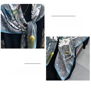 Detailed close-up showing precision machine-stitched edges on floral print silk scarf