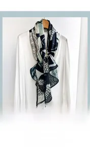 Detail of silk-like neckerchief with floral rose patterns tied on a white blouse