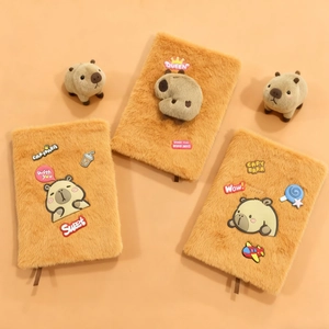 Three plush Capybara A5 notebooks with fluffy brown covers and cute cartoon patches