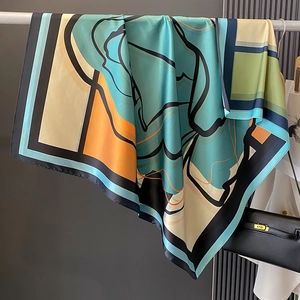 Silk satin square shawl with modern abstract geometric print and artistic color blocks