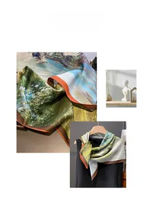 Detail view of impressionist oil painting pattern and hand-rolled edges on silk scarf