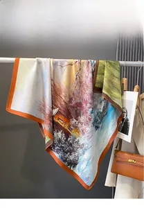 Detail of double-sided printed silk scarf with impressionist oil painting patterns