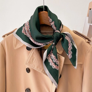 Elegant silk-touch silk scarf with retro chain print on stylish khaki trench coat