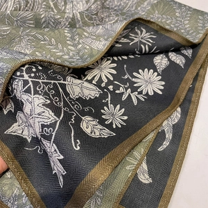 Vintage floral silk scarf with herringbone texture and elegant deep green pattern