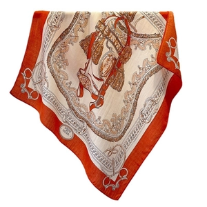 Elegant silk scarf featuring equestrian bridle prints and vibrant orange border