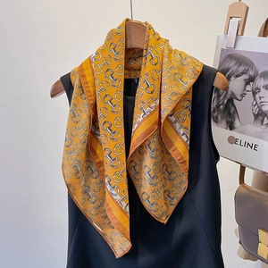 Elegant geometric horse-bit print square scarf in ginger yellow cotton-linen blend fabric