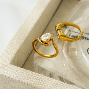 18K gold plated titanium steel ring set with oval zircon and twisted band design
