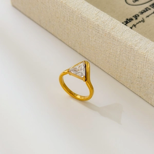 Detail of 18K gold-plated titanium ring with a triangle-cut clear zircon stone inlay