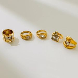 Five-piece stackable 18K gold plated titanium steel rings with oval zircon and geometric stones