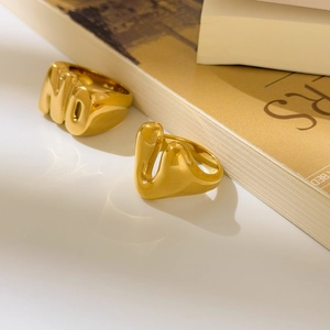 Chic 18K gold plated titanium rings with hollow NO letter and abstract wave shell design