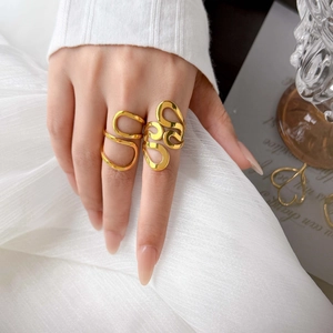 18K gold-plated titanium steel ring featuring minimalist hollow heart curved lines