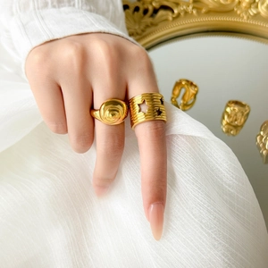 Set of 18K gold-plated titanium steel rings featuring conch shell and star cutouts