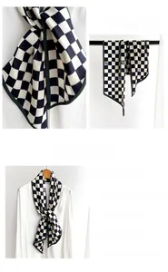 Macro shot of 21x144cm black and white checkered diagonal scarf with green edges