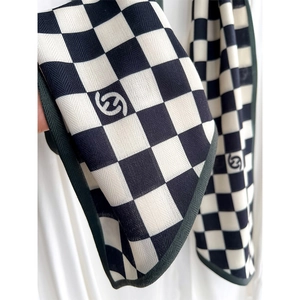 Classic checkered knit scarf with green edges and logo detail for women's spring style