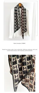 Detail of grey-green scarf with letter pattern jacquard and soft velvet-like fabric texture