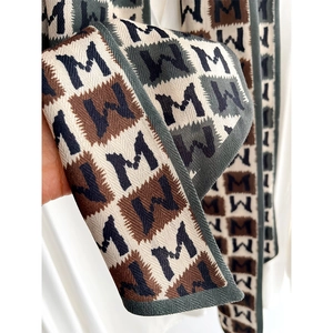 Korean style narrow neck scarf with vintage geometric M letter pattern in brown tones
