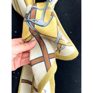 Silk feel neck scarf with yellow equestrian horse motif and twill pattern design