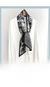 Detail of elegant Toile de Jouy and houndstooth pattern double-layer silk neck scarf