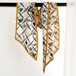 Chic narrow horse print scarf in beige and mustard yellow for stylish neck or bag decoration