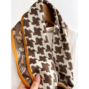 Fashion geometric silk scarf with houndstooth and paisley patterns in brown and orange