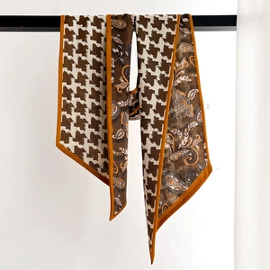 Retro geometric twilly scarf featuring paisley patterns and brown houndstooth details