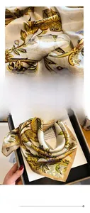 Detail of silk scarf with vintage baroque floral print and high-quality stitched edges