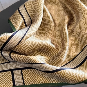 Silk square scarf with gold geometric maze pattern and Greek key border design